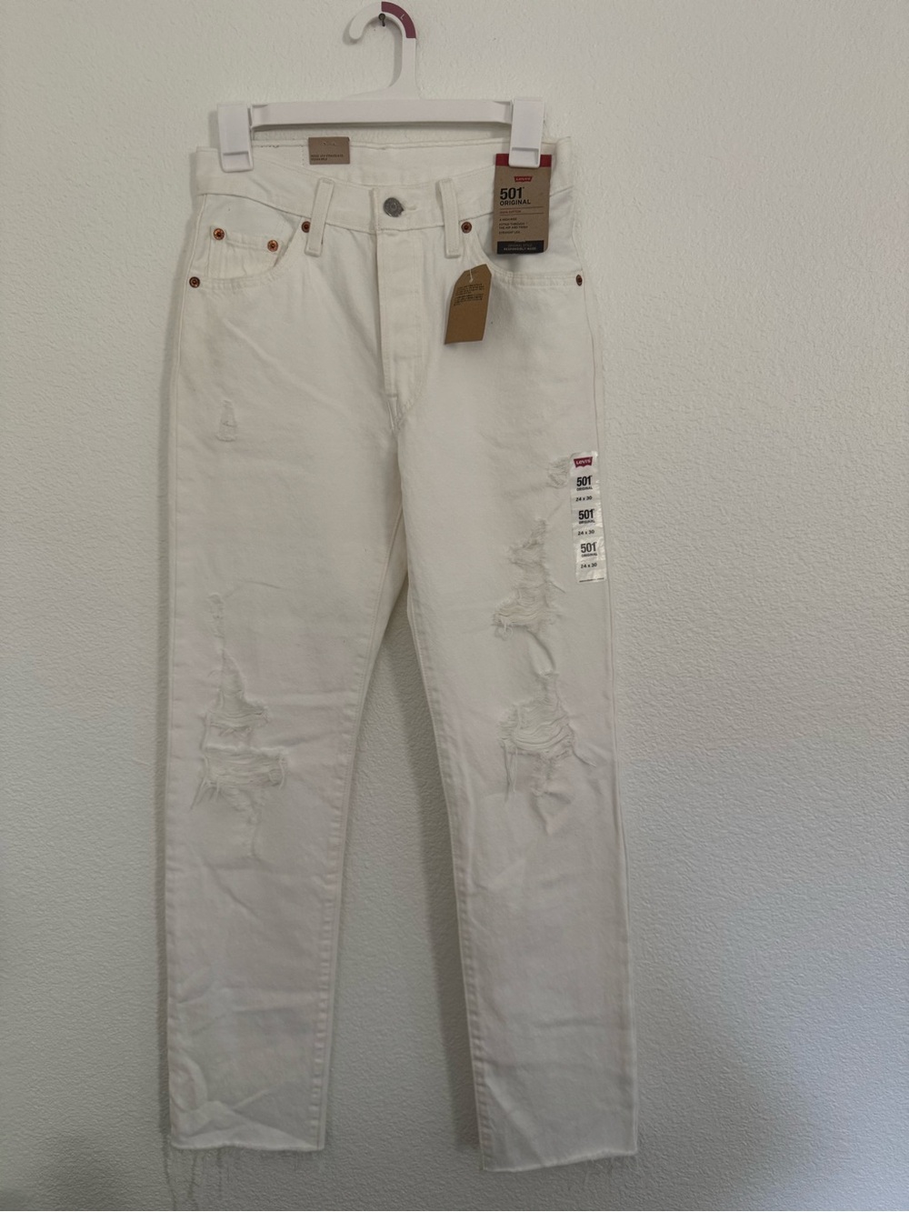Levi's 501 Original White Distressed Ripped Jeans
Size 24 x 30 NWT
